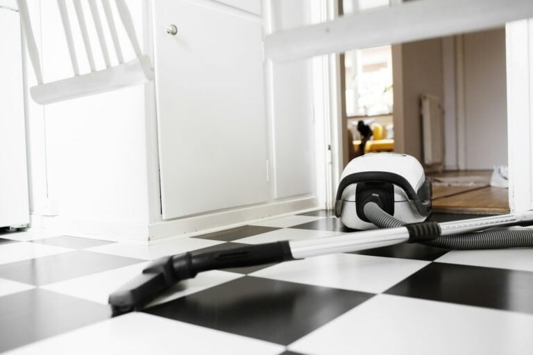 Vacuum cleaner on tiled floor